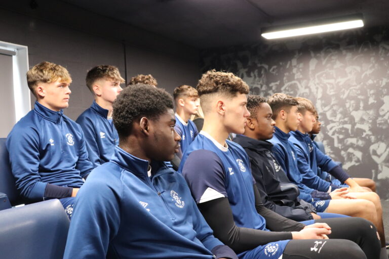 Luton Town academy players watch as Roseann Taylor from the VERU gives them a talk about the impact of knife crime
